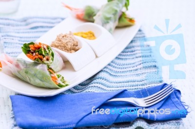 Vietnamese Spring Rolls With Vegetables And Coriander On A Plate… Stock Photo