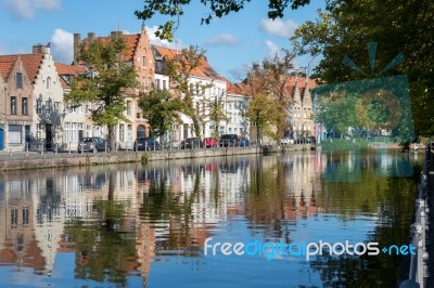 View Along A Canal In Bruges West Flanders In Belgium Stock Photo