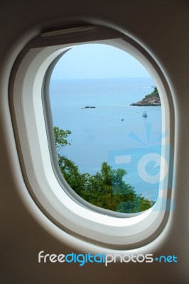 View From Window With Airplane Stock Photo
