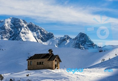 View Of A Chapel In The Dolomites At The Pordoi Pass Stock Photo
