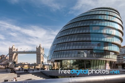 View Of City Hall And Tower Bridge In London Stock Photo