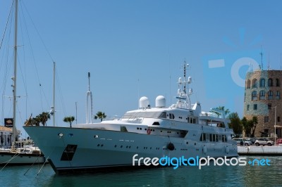 View Of Luxury Yachts In The Harbour At Porto Banus Stock Photo