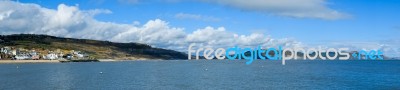 View Of Lyme Regis Bay From The Harbour Entrance Stock Photo