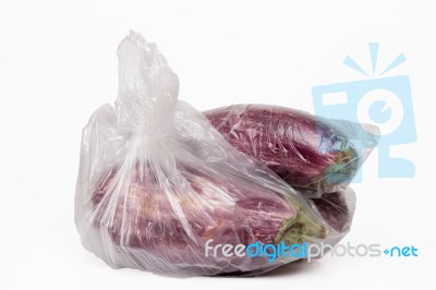 View Of Some Eggplant Inside A Plastic Bag Stock Photo