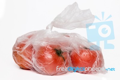 View Of Some Tomato Inside A Plastic Bag Stock Photo