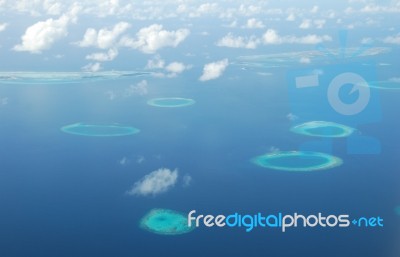 View On Maldives Islands From Airplane Stock Photo