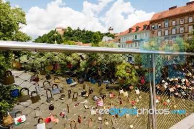 View Over Love Lockers To The Old Clock Tower On Schlossberg, Castle Hill, In Graz, Austria Stock Photo