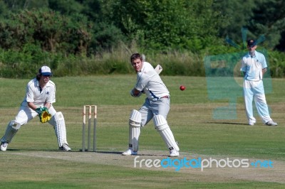 Village Cricket Being Played At Coleman's Hatch Stock Photo