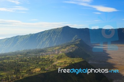 Village Near Cliff At Bromo Stock Photo