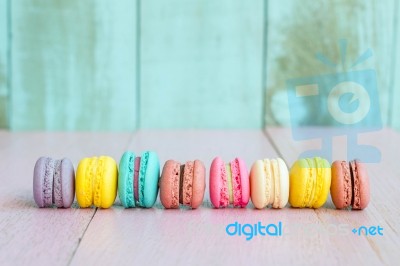 Vintage Colorful  Macarons On Pink Wooden Background Stock Photo