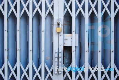 Vintage Locked Old Metal Door Stock Photo