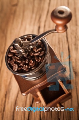 Vintage Manual Coffee Grinder With Coffee Beans Stock Photo