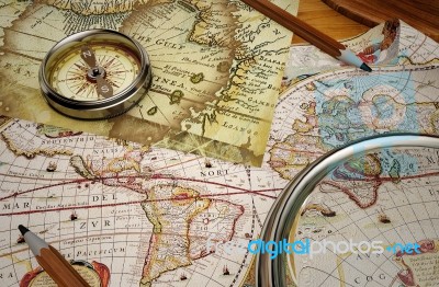 Vintage Map And Vintage Compass With Magnifying Glass At The Corner Stock Image
