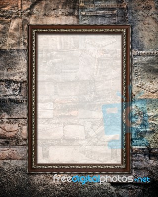 Vintage Picture Frame On Collage Rotten Jeans Stock Photo