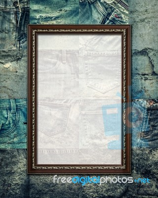 Vintage Picture Frame On Collage Rotten Jeans Stock Photo