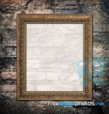 Vintage Picture Frame On Collage Rotten Jeans Stock Photo