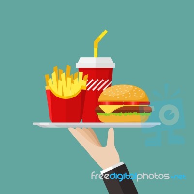 Waiter Serving A Hamburger French Fries And Soda Stock Image