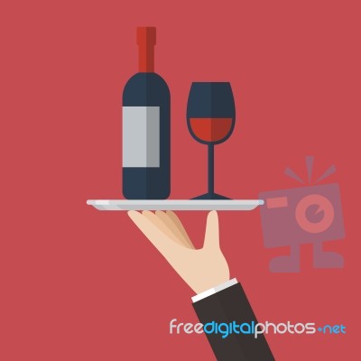 Waiter Serving A Wine Bottle And Wine Glass Stock Image