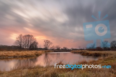 Warm Winter. Sunset With Clouds Stock Photo