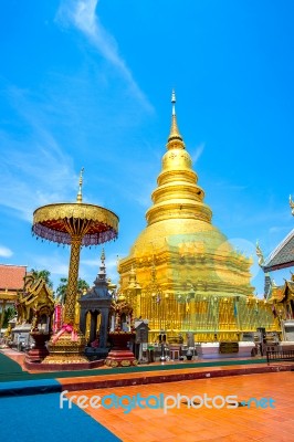 Wat Phrathat Hariphunchai Golden Pagoda In Lamphun,thailand Stock Photo