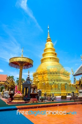 Wat Phrathat Hariphunchai Golden Pagoda In Lamphun,thailand Stock Photo