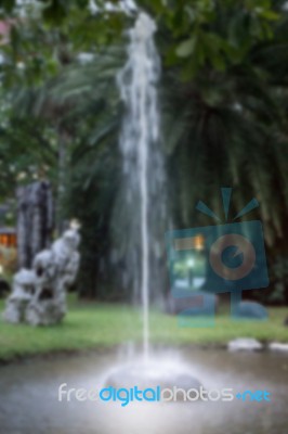 Water Fountain In Scenic Garden Stock Photo