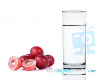 Water Of Glass With Grape Isolated On The White Background Stock Photo