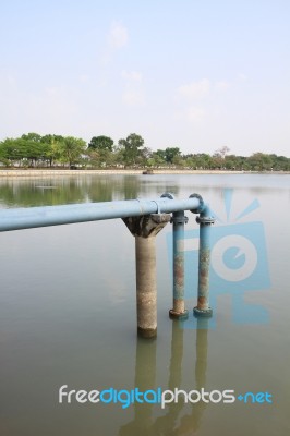 Water Supply Pipes From Lake Stock Photo