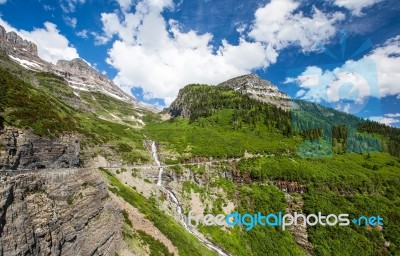 Waterfall In Glacier National Park Stock Photo