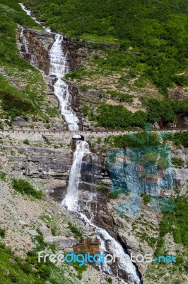 Waterfall In Glacier National Park Stock Photo