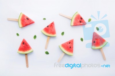 Watermelon Slice Popsicles On White Background Stock Photo