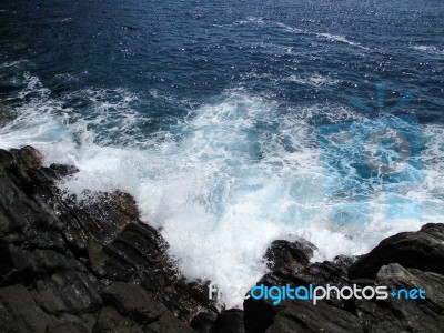 Waves Crashing On The Rocks Of The 5 Lands C Stock Photo