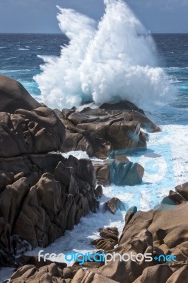 Waves Pounding The Coastline At Capo Testa Sardinia Stock Photo
