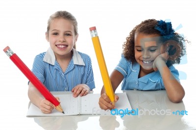 We Are Using Giant Pencils ! Stock Photo