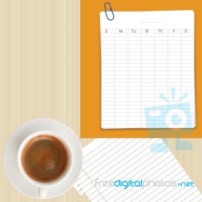 Weekly Planner Grid Sheet And Coffee Cup On Wood Background Stock Image