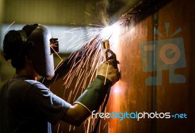 Welder In A Factory Stock Photo