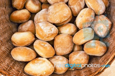Wheat White Breackfast Bread Rolls In A Rustic Braided Basket Stock Photo