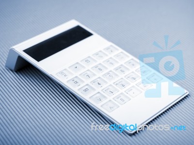 White Calculator Stock Photo