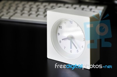 White Clock, Keyboard, Business Table In The Office Stock Photo