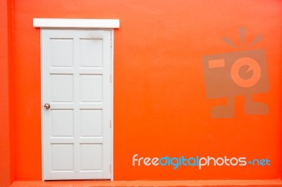 White Door Classic Vintage On The Color Red Wall Background Stock Photo