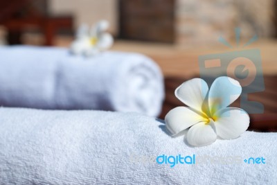 White Flower On Towel Stock Photo