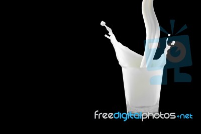 White Milk In Glass Stock Photo