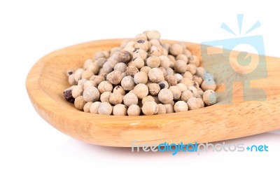 White Pepper In Wooden Spoon On Whit Background Stock Photo