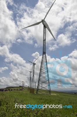 Wind Turbines On A Hill Crest Stock Photo