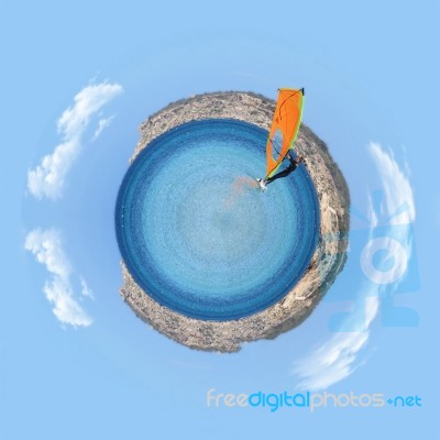 Windsurfer Enjoying A Summer Day In A Mediterranean Sea, Little Planet Effect Know Also As Stereographic Projection Stock Photo