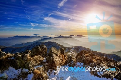 Winter Landscape With Sunset And Foggy In Deogyusan Mountains, South Korea Stock Photo