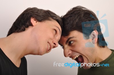 Woman And Man Yelling Face To Face Stock Photo