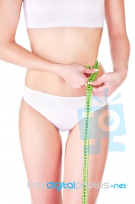 Woman And Measure Tape Stock Photo
