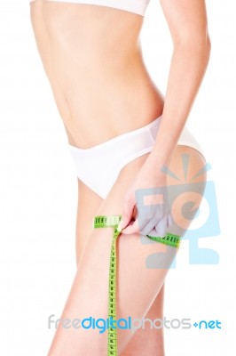 Woman And Measure Tape Stock Photo