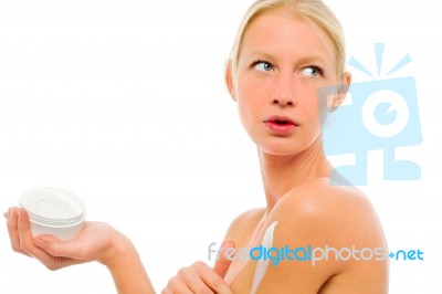 Woman Applying Beauty Cream Stock Photo
